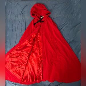 Red wool cloak with black accents from Colonial Williamsburg Virginia.